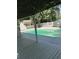 A view of the pool, pool house and white lattice gazebo at 1789 Springhouse Ct, Lawrenceville, GA 30043
