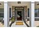Open entryway with stone details and a view of the staircase at 236 Lakestone Pkwy, Woodstock, GA 30188