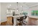 Spacious kitchen with a large island, stainless appliances, and breakfast bar seating at 236 Lakestone Pkwy, Woodstock, GA 30188