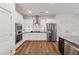 Well-equipped kitchen with stainless steel appliances and plenty of counter space at 236 Lakestone Pkwy, Woodstock, GA 30188