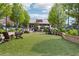 Relaxing outdoor lounge area with artificial turf and comfortable seating at 236 Lakestone Pkwy, Woodstock, GA 30188