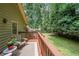 Enjoy nature from this back deck which offers a peaceful view of the well-maintained backyard at 269 Powder Mill Dr, Dallas, GA 30157