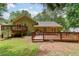 Expansive backyard featuring a large deck and tiered decks great for outdoor living at 269 Powder Mill Dr, Dallas, GA 30157