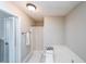 This bathroom features a shower-tub combo with a stylish shower curtain and a neutral color scheme at 269 Powder Mill Dr, Dallas, GA 30157