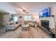 Bright living room features a fireplace, plush sectional sofa, and stylish decor at 269 Powder Mill Dr, Dallas, GA 30157