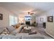 Inviting living room features a fireplace, plush sectional sofa, and ample natural light at 269 Powder Mill Dr, Dallas, GA 30157