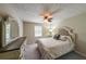 Comfortable main bedroom featuring plush carpeting, a large mirror, and lots of natural light at 269 Powder Mill Dr, Dallas, GA 30157