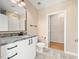 Bright bathroom features granite counters, modern fixtures, and tiled flooring at 923 Peachtree Ne St # 932, Atlanta, GA 30309