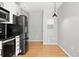 Modern kitchen features stainless steel appliances and sleek countertops at 923 Peachtree Ne St # 932, Atlanta, GA 30309