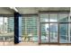 Bright living space with floor-to-ceiling windows and balcony with city views at 923 Peachtree Ne St # 932, Atlanta, GA 30309