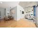 Open-concept living area with hardwood floors, modern furniture, and lots of natural light at 923 Peachtree Ne St # 932, Atlanta, GA 30309