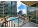 View from balcony overlooking community pool at 923 Peachtree Ne St # 932, Atlanta, GA 30309