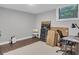 Unfinished basement space with gray cinderblock walls, a small window and furniture boxes at 2994 Baker Ridge Nw Dr, Atlanta, GA 30318