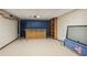 Spacious basement area featuring a bar, shelves, and a decorative piece at 9055 Green Valley Ct, Douglasville, GA 30134