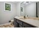 Powder room featuring neutral color palette, sleek vanity, and modern fixtures at 9055 Green Valley Ct, Douglasville, GA 30134