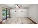 Spacious bedroom with natural light and access to a balcony, creating a peaceful retreat at 9055 Green Valley Ct, Douglasville, GA 30134