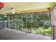 View from spacious screened-in porch overlooking the wooded backyard at 9055 Green Valley Ct, Douglasville, GA 30134