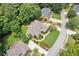 Overhead view of home with mature trees, and a well-kept lawn in a quiet neighborhood at 1345 Benbrooke Nw Ln, Acworth, GA 30101