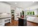 Bright and efficient kitchen featuring granite countertops, hardwood flooring, and modern appliances at 1345 Benbrooke Nw Ln, Acworth, GA 30101