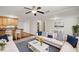Open-concept living area featuring a modern kitchen bar and comfortable seating with stylish decor at 1345 Benbrooke Nw Ln, Acworth, GA 30101