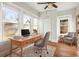 Bright home office featuring natural light, built-in shelving, and hardwood flooring at 1015 Deckner Sw Ave, Atlanta, GA 30310