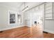 Sunlit living room with built-in shelving and a view of the fireplace at 1015 Deckner Sw Ave, Atlanta, GA 30310