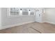 Living room features recessed lighting, neutral decor and durable flooring at 1015 Deckner Sw Ave, Atlanta, GA 30310