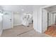 Bright open space with modern features, a white kitchen and durable flooring at 1015 Deckner Sw Ave, Atlanta, GA 30310
