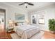 Comfortable main bedroom with hardwood floors, natural light, and neutral decor at 1015 Deckner Sw Ave, Atlanta, GA 30310