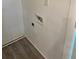 This is a picture of the laundry hookups at 10591 Flat Shoals Rd Rd, Covington, GA 30016
