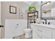 Beautiful bathroom features marble sink, black fixtures, and stylish patterned tile flooring at 146 Henderson Farm Ln, Canton, GA 30115