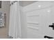 Clean bathroom showcases bathtub with white subway tiles and showerhead at 146 Henderson Farm Ln, Canton, GA 30115