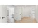 Bright bedroom with hardwood floors opens to a luxury bathroom and closet at 3785 Lower Roswell Rd, Marietta, GA 30068