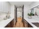 Modern kitchen featuring white quartz countertops, stainless steel appliances, and a stylish design at 904 Ivy Green Se Ln, Marietta, GA 30067