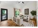 Bright living room features vaulted ceilings, hardwood floors and access to private deck at 904 Ivy Green Se Ln, Marietta, GA 30067
