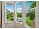 Bay window view overlooking lush backyard with pool and mature trees at 904 Ivy Green Se Ln, Marietta, GA 30067