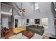 Open-concept living room with cozy seating, hardwood floors, and natural light at 9176 Lakeview Pkwy, Villa Rica, GA 30180