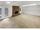 Spacious basement with a classic brick fireplace and walk-out access to the outdoors at 6354 Shannon Pkwy # 8B, Union City, GA 30291