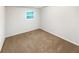 Cozy bedroom with soft carpeting and a bright window, creating a serene and comfortable atmosphere at 6354 Shannon Pkwy # 8B, Union City, GA 30291