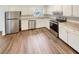 Kitchen with stainless steel appliances and white cabinets at 6354 Shannon Pkwy # 8B, Union City, GA 30291