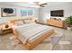 Staged main bedroom with updated decor and furniture at 6354 Shannon Pkwy # 8B, Union City, GA 30291