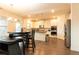 Bright and open kitchen with modern appliances, island, and hardwood floors at 905 Eldridge Rd, Hampton, GA 30228