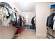 Spacious walk-in closet with ample hanging space and shelving for organized storage at 905 Eldridge Rd, Hampton, GA 30228