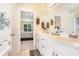 Bathroom featuring a double vanity, a garden tub and a walk in shower at 1856 Temple Park Dr, Loganville, GA 30052