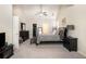 Spacious bedroom with vaulted ceiling, a ceiling fan, and neutral décor at 1856 Temple Park Dr, Loganville, GA 30052
