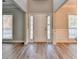 Bright entryway with beautiful wood-look flooring and natural light at 2035 Lena Carter Rd, Buford, GA 30519