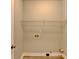 This laundry room has connections for washer and dryer and features a wire rack for storage at 2035 Lena Carter Rd, Buford, GA 30519