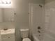 Bathroom featuring modern fixtures including a vanity, toilet and shower/tub combo at 5512 Arrowhead Dr, Acworth, GA 30102
