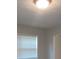 Bright bedroom with neutral walls and a window at 5512 Arrowhead Dr, Acworth, GA 30102