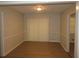 Dining area featuring neutral paint, chair rail detail, and wood-look floors at 5512 Arrowhead Dr, Acworth, GA 30102